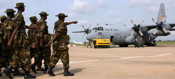 Nigerian troops with US C130 - Image in the public domain